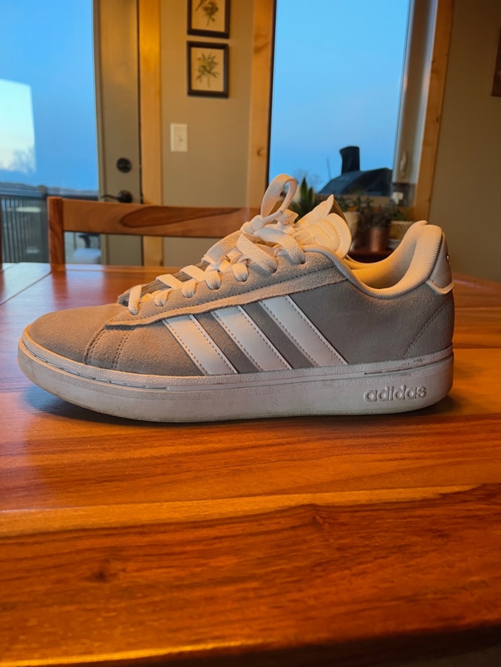 adidas light gray and white low-top sneaker